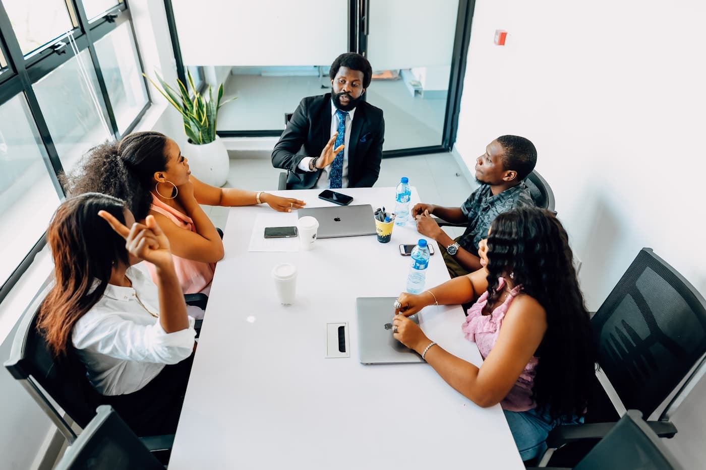 A team of professionals collaborating around a conference table
